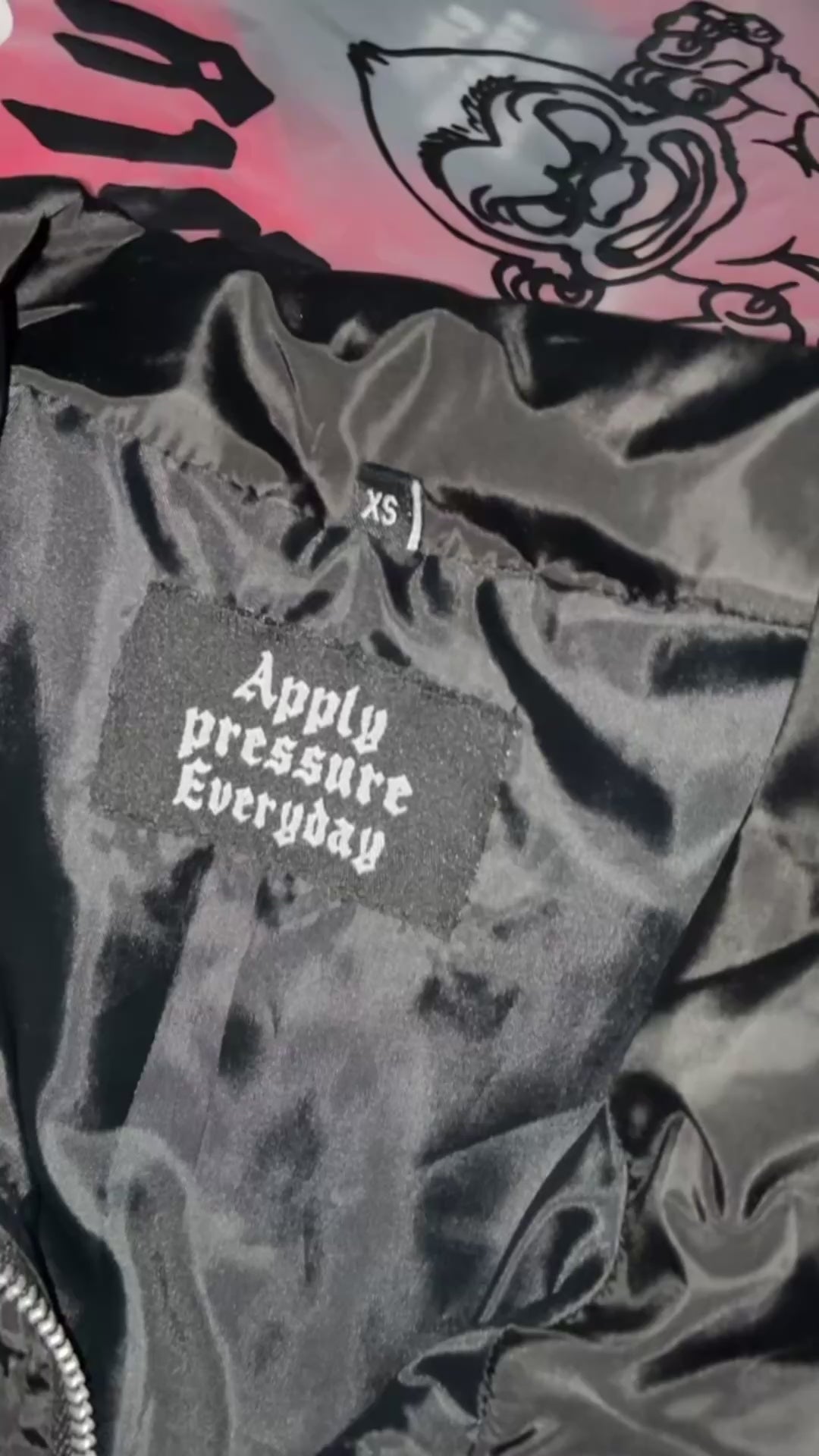 Black windbreaker